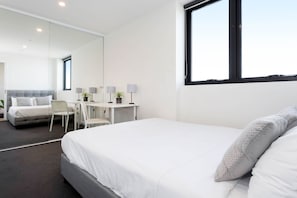 2 bedrooms, desk, laptop workspace, iron/ironing board
