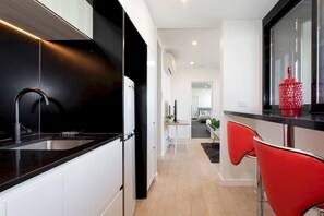 2 bedrooms, desk, laptop workspace, iron/ironing board