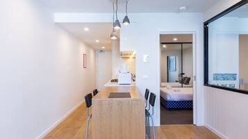 1 bedroom, laptop workspace, iron/ironing board, bed sheets