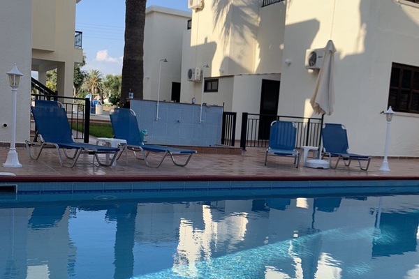 Outdoor pool, open 9:00 AM to 7:00 PM, pool umbrellas, sun loungers