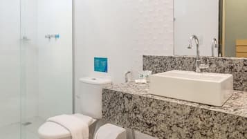 Shower, bidet, towels, soap