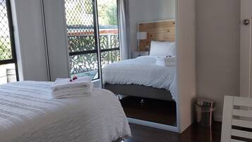 4 bedrooms, desk, iron/ironing board, travel cot