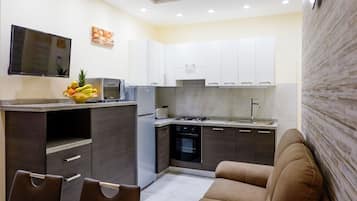 Apartment, 2 Bedrooms | Private kitchen | Full-size fridge, microwave, oven, stovetop