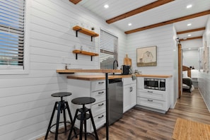 Fridge, microwave, stovetop, coffee/tea maker
