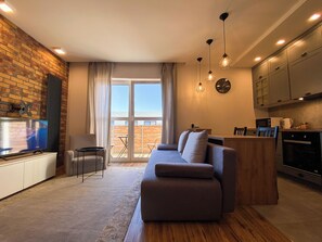 Tabla de planchar con plancha, wifi gratis, ropa de cama