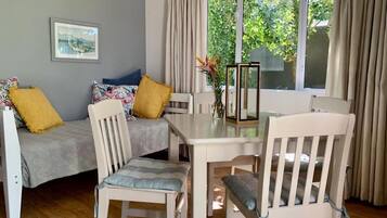 Deluxe Cottage, 1 Bedroom | Living area | Smart TV