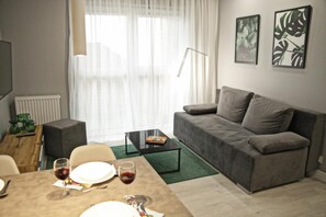 Comfort Apartment | Living area | Flat-screen TV - BP Apartment IV (Torun)