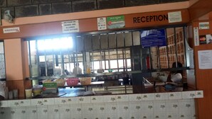 A reception area with a sign indicating no food or drinks are allowed from outside. - Pyramid Restaurant (Naivasha)