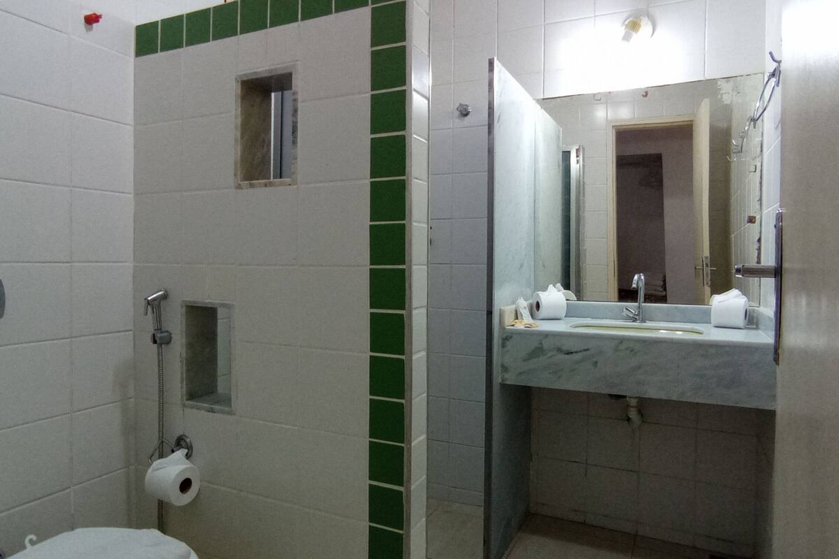 superior quadruple room | bathroom | shower, free toiletries, towels, soap