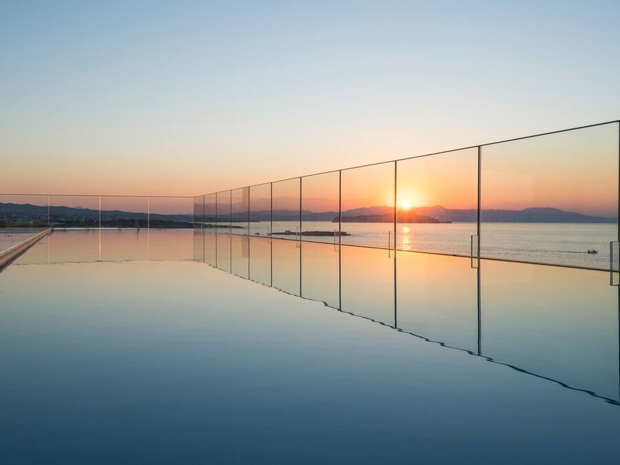 Seasonal outdoor pool, open 9:30 AM to 6:30 PM, pool umbrellas