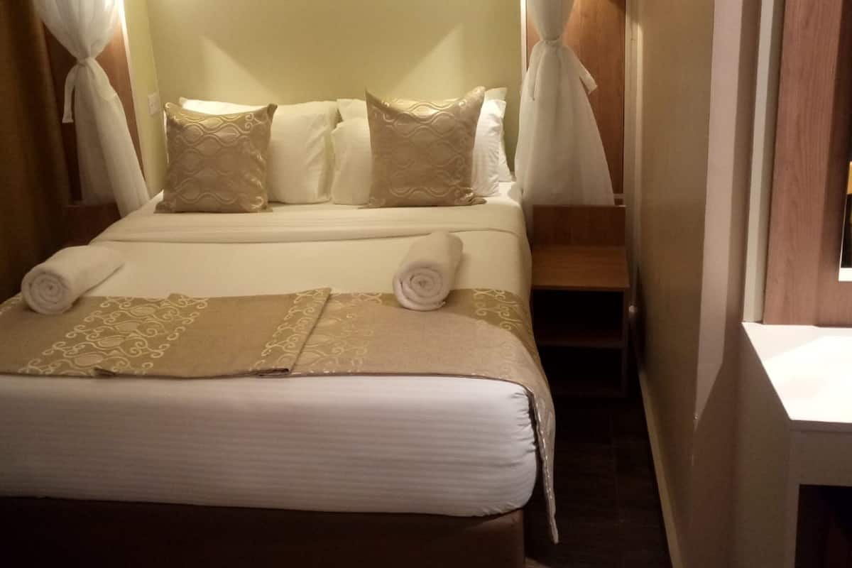 Desk, blackout drapes, WiFi (free), bed sheets