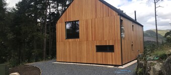 An Caisteal Lodge With Cascading Waterfall View