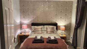 Apartment, 1 Queen Bed | 1 bedroom, iron/ironing board, free WiFi, bed sheets