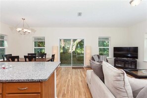 House, Multiple Beds, Kitchen, Garden View | Living room | TV - Ocean Palms, 4 Bedroom, Walk to the Beach, Sleeps 8 (St. Augustine)