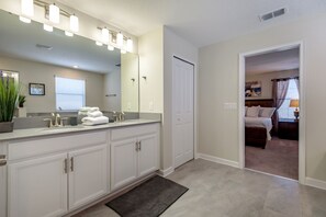 Bathtub, towels, toilet paper