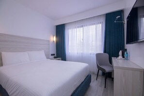 Habitación doble | Escritorio, wifi gratis y ropa de cama 