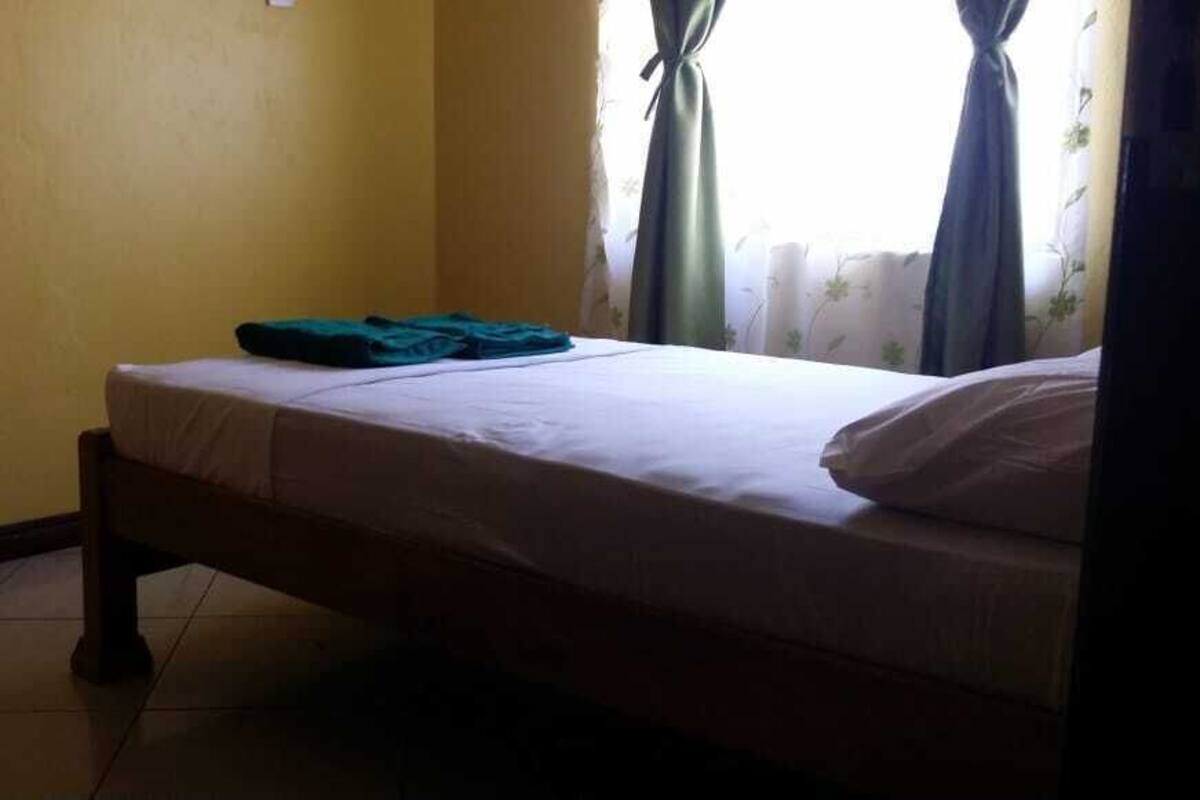 Standard Room | Iron/ironing board (on request), bed sheets