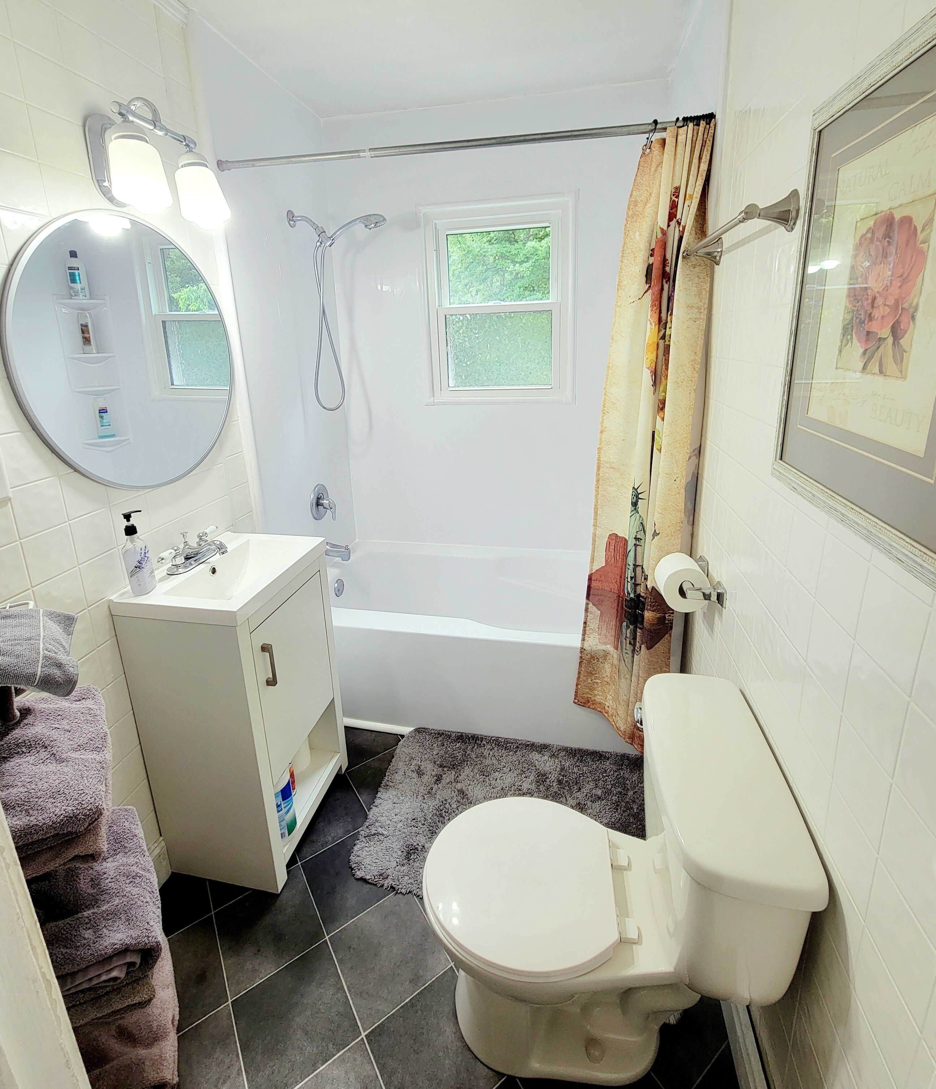 Combined shower/tub, hair dryer, towels, soap