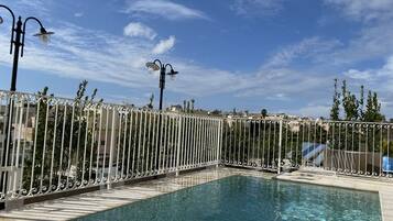 Outdoor pool, sun loungers