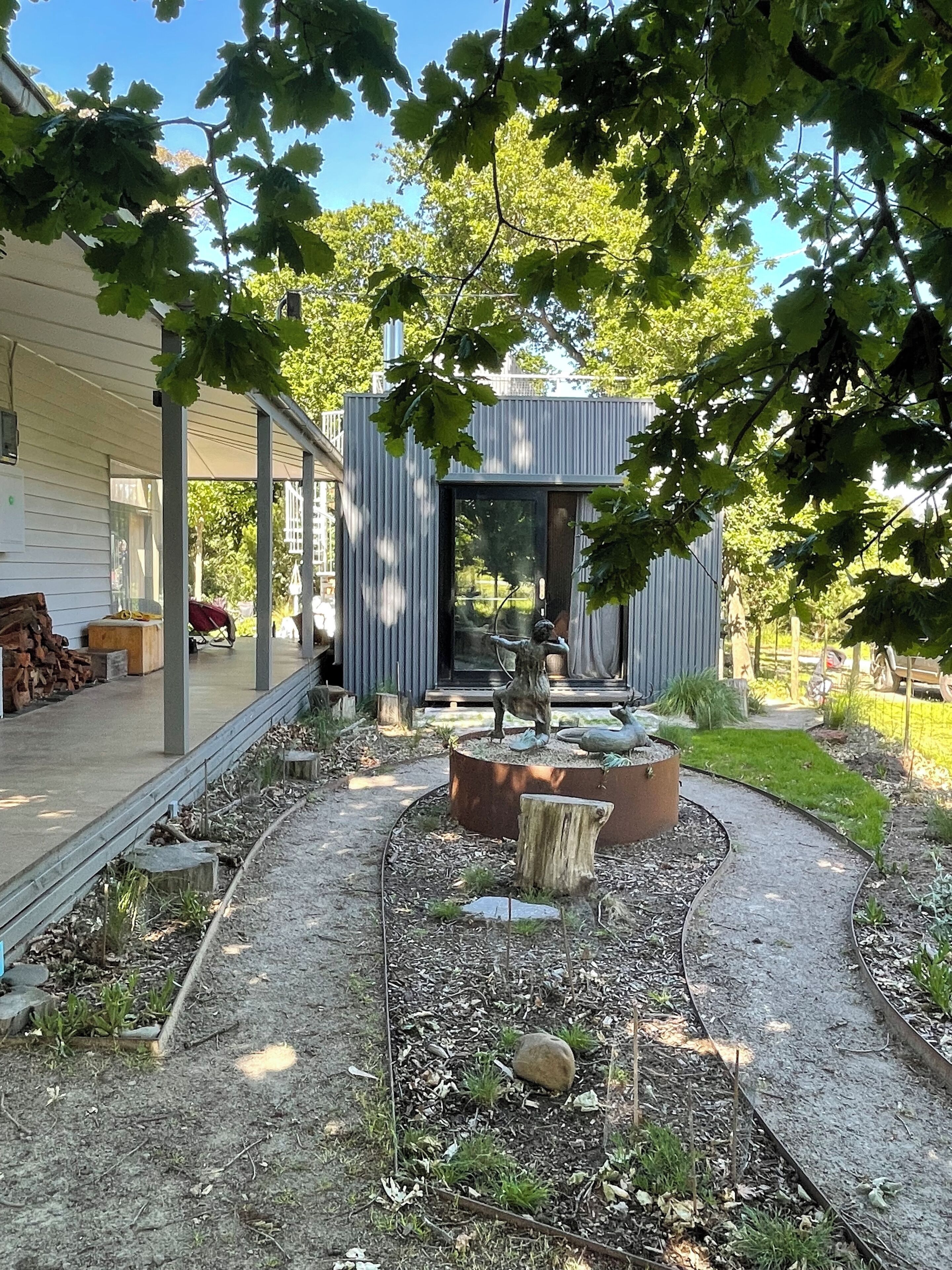 Side garden with statue