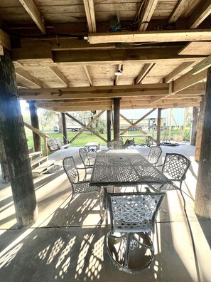 Outdoor dining - Beautiful, Relaxing, Spacious Cottage with view of Vermillion Bay! (Cypremort Point)