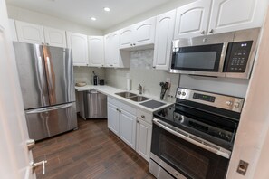 Fridge, microwave, dishwasher, coffee/tea maker