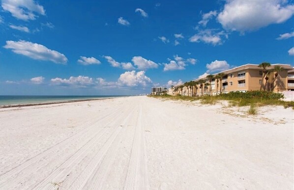 On the beach, sun-loungers, beach towels