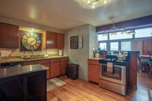 Fridge, microwave, oven, stovetop - Lakefront Cabin w/ Hot Tub & Private Dock (Sagle)