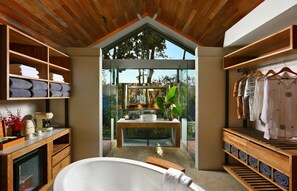 Bathtub, hair dryer, bidet, towels