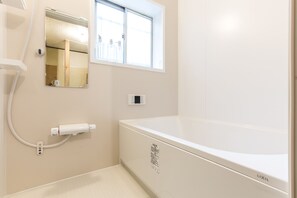 Private Vacation Home | Bathroom | Separate tub and shower, free toiletries, hair dryer, electronic bidet - Higashimukoujima A (Tokyo)