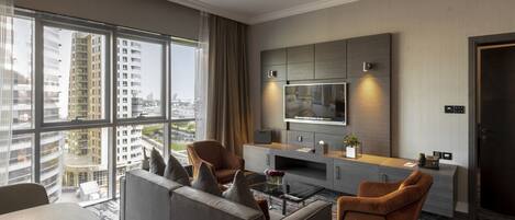 One Bedroom Suite Creekside | Living room | 40-inch flat-screen TV with cable channels, TV