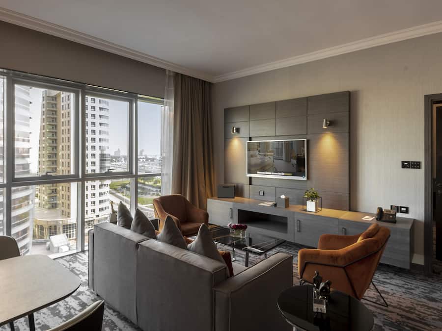 One Bedroom Suite Creekside | Living room | 40-inch flat-screen TV with cable channels, TV