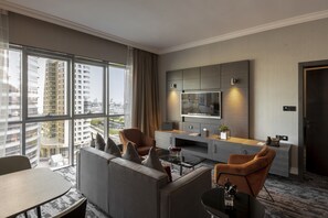 One Bedroom Suite Creekside | Living room | 40-inch flat-screen TV with cable channels, TV - Edge Creekside Hotel (Dubai)