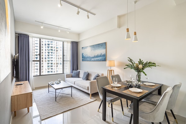 Apartment, 2 Bedrooms | Living area | 41-inch TV with cable channels