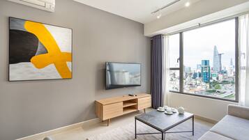 Apartment, 2 Bedrooms | Living area | 41-inch TV with cable channels