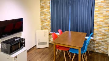 Superior Quadruple Room | Living area | 32-inch LCD TV with digital channels, TV
