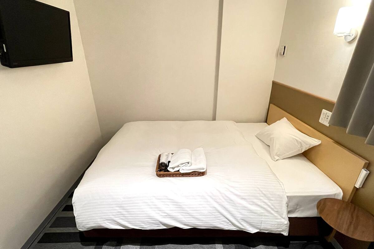 down duvets, desk, blackout curtains, iron/ironing board