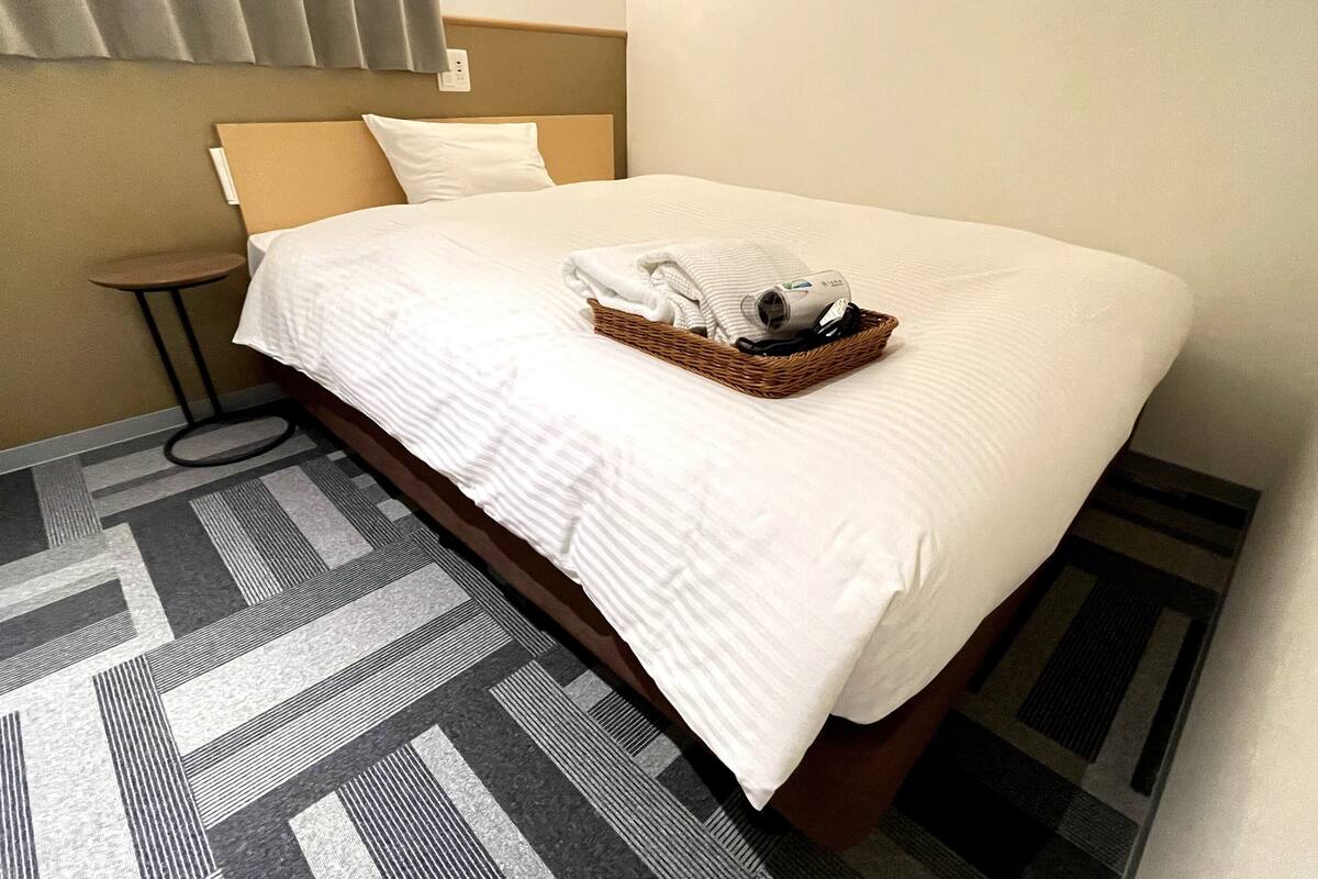 down duvets, desk, blackout curtains, iron/ironing board