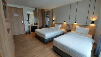 Superior Twin Room | In-room safe, individually decorated, desk, laptop workspace