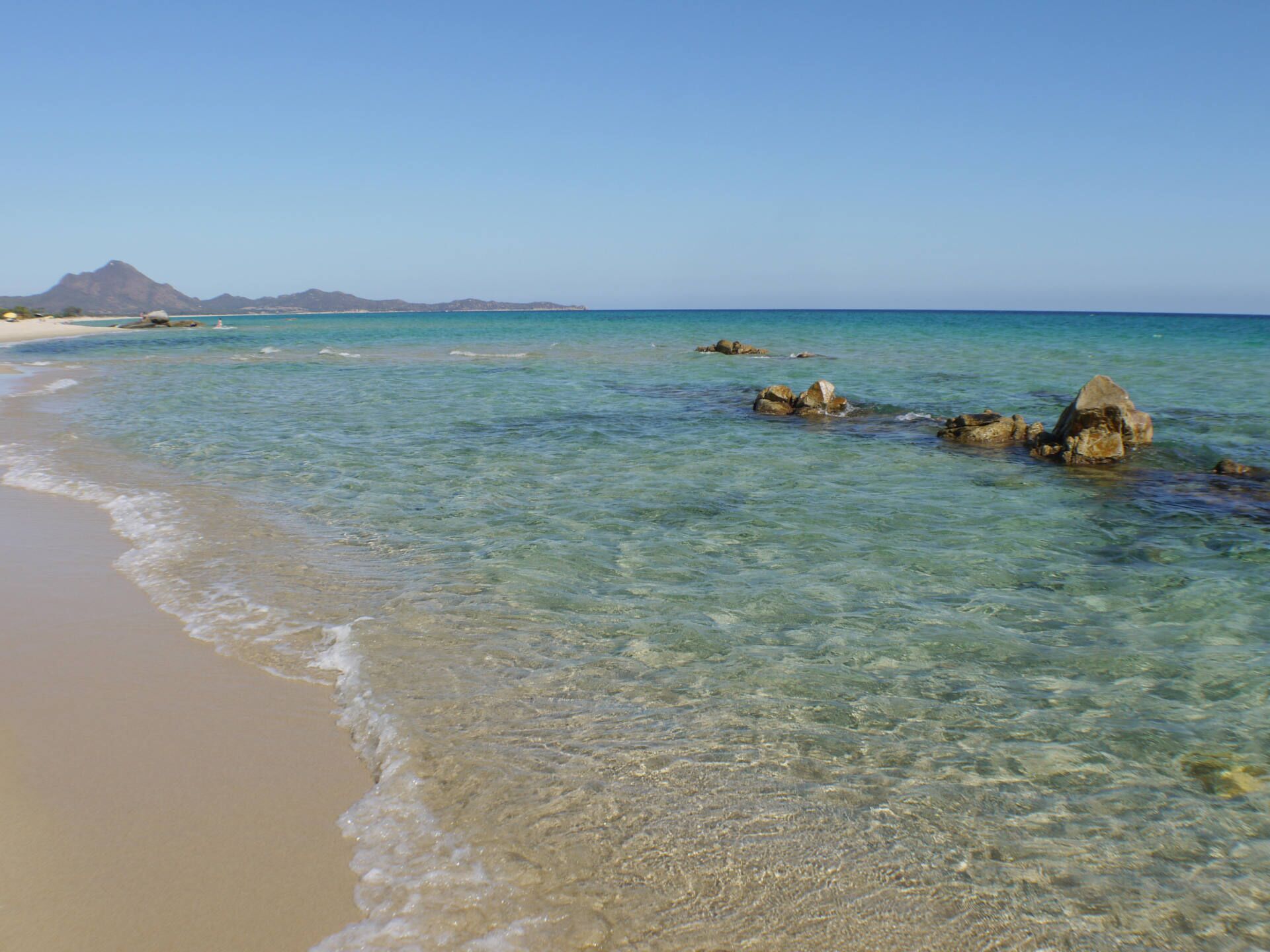On the beach, sun loungers