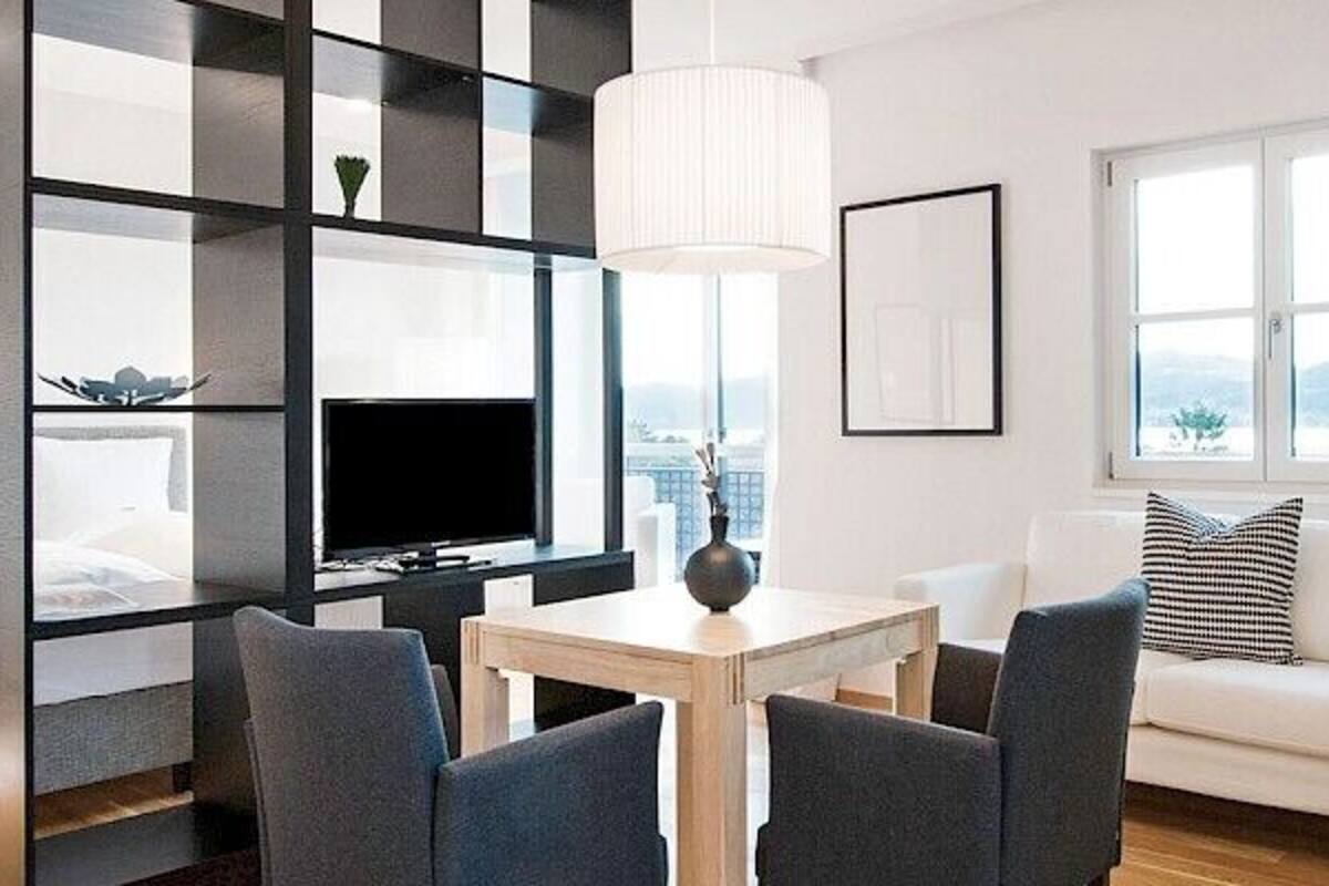 Studio, Lake View | Living area | Flat-screen TV