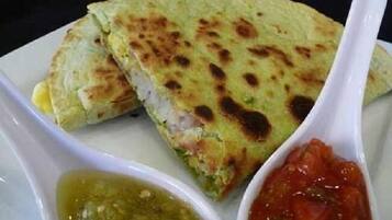 Daily cooked-to-order breakfast (INR 250 per person)