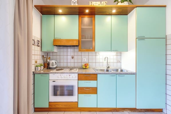 Fridge, oven, stovetop, espresso maker