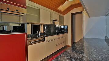 Apartment, 2 Bedrooms | Private kitchen | Full-size fridge, microwave, oven, stovetop