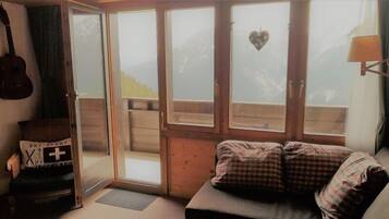 Apartment, 4 Bedrooms | Living room | TV, DVD player