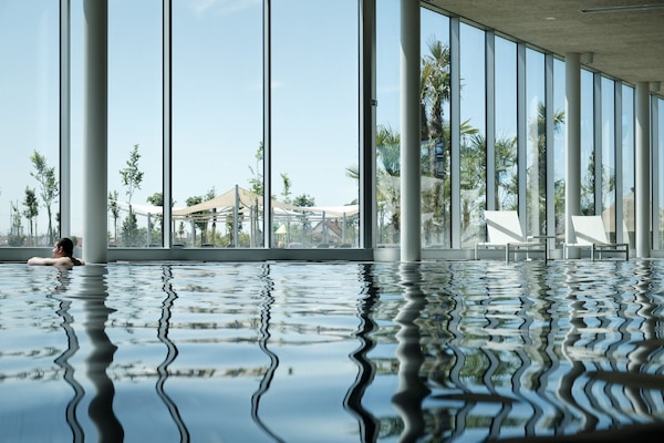 2 indoor pools, seasonal outdoor pool, sun loungers, lifeguards on site