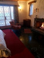 Family Room | Premium bedding, down comforters, desk, laptop workspace
