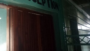 A reception area with a sign that reads "RECEPTION". - Top Lodge (Naivasha)