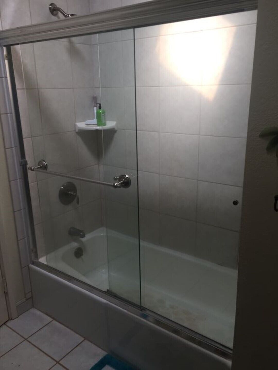 Combined shower/tub, hair dryer, towels, soap