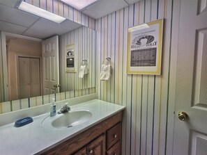 Bathtub, hair dryer, towels